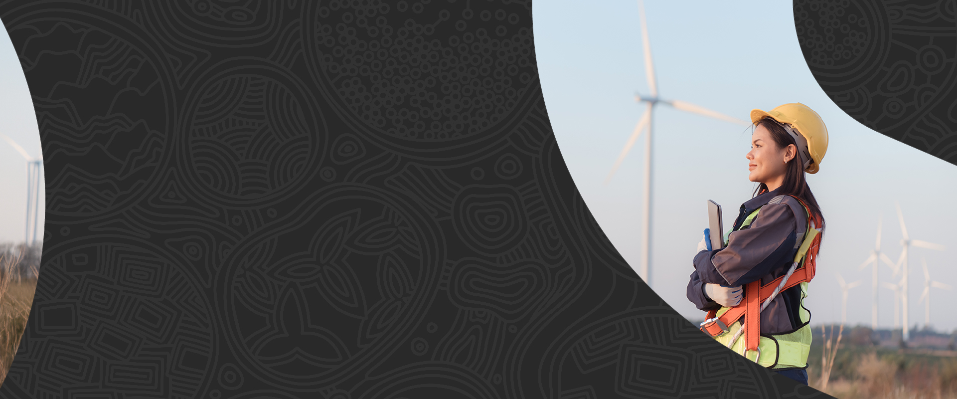A black decorative banner featuring First Nations line art representing clean energy resources. Within the banner features a female engineer, standing in a field with wind turbines. 